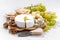 Camembert, grapes and crackers on a white background, closeup