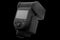 Camera external flash speedlight isolated on black background