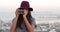 Camera, photography and woman taking a photo in the city on an outdoor adventure or vacation. Travel, urban town and