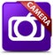 Camera purple square button red ribbon in corner