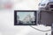 Camera recording the white buildings from Piccadilly Circus