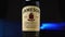 The camera rotates around a bottle of Jameson Irish whiskey. Close-up. Slow motion. Parallax effect. Jameson whisky -
