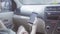 Camera shows young woman with smartphone in car, then cute long haired guy