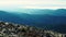 Camera takes panoramic view from peak of Carpathian mountain range.