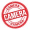 CAMERA text written on red round stamp sign