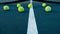 Camera tilt group of balls at tennis court 4k