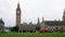Camera Tracks London Bus Across Parliament