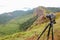 Camera on tripod Photographers take photo at Doi Mon Jong, a popular mountain near Chiang Mai