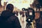 Cameraman with his video camera shooting outdoor in Historical center of Seville, Spain