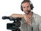 Cameraman with professional camcorder and headphone isolated on