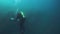 Cameramen scuba diver under water in Lake Baikal.