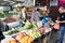 CAMERON HIGHLANDS, MALAYSIA, APRIL 6, 2019: Tourist and shoppers shopping fresh agriculture produce from street stalls market,