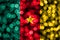 Cameroon abstract blurry bokeh flag. Christmas, New Year and National day concept flag