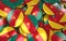 Cameroon Badges Background - Pile of Cameroonian Flag Buttons.
