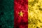 Cameroon grunge flag on old dirty wall