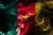 Cameroon smoke flag national flag on a black background.