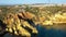 Camilo beach (Praia do Camilo) in Lagos, Algarve, Portugal. Wooden footbridge to the beach Praia do Camilo, Portugal