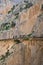 Caminito del Rey. Visitors walking on the new wooden pathway pinned along the steep walls of a narrow gorge in El Chorro, near Ard