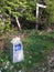 Camino trail marker with small stones on top from passing pilgrims.