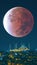 Camlica Mosque and lunar eclipse. Ramadan or islamic vertical photo