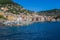 Camogli marina harbor, boats and typical colorful houses. Travel destination Ligury, Italy.