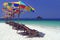 Camp Bed under colorful umbrella on the beach