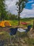 camp at forest hammock with tent and portable chairs