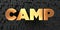 Camp - Gold text on black background - 3D rendered royalty free stock picture
