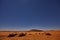 Camp in Sahara Desert in night with moon as star