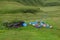 Camp site trekkers blue and orange tents green dzukou valley eco tourism