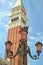 Campanile with pigeons on old lantern
