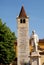 Campanile and white statue in Verona