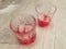 Campari served in two crystal glass with ice cubes