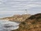 Campbell Point lighthouse in Marlborough region of the South Island of New Zealand with moody sky