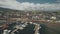 Campbeltown seascape with yachts, cutters, boats, ships on harbor. Aerial Europe port town cityscape