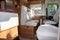 Camper Dining Room place with wooden white interior in front van seat vanlife