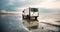 Camper van driving next to the wadden sea at low tide, traveling at the beach of Romo in Denmark, adventure vacation und lifestyle