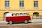 Camper Van Parked By A Yellow Building