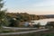 Camper vans and motorhomes living van life social distancing on a calm landscape by Nisa Dam in Alentejo, Portugal at sunset