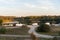 Camper vans and motorhomes living van life social distancing on a calm landscape by Nisa Dam in Alentejo, Portugal at sunset