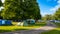 Camper vans and tents pitched at a camp site during the summer