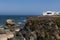 Campers parked on a cliff near the village of Porto Covo, in the Costa Vicentina Natural Park in Portugal