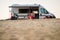 Campervan or motorhome parked on the beach in Greece