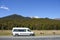 Campervan parked in a laybay on a remote road