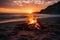 A campfire on the beach at sunset is a picturesque scene of a warm, crackling fire against the serene backdrop of the