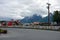 A campground in alaska with snow-capped mountains in the background.