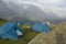 Campground blue tents in the snow mountains