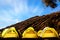 Campground in the mountains. Many yellow tents against the blue sky