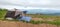 The Campground small Tent and Travel Trailer in the Background. Cliff edge Campground .  Outdoor Lifestyle Photo