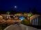 Camping, beautiful glamping, pool lighting in the evening, blue night sky, moon shining